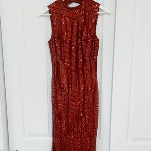 Floor length open back sequin gown